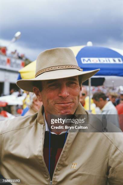Captain Mark Phillips, the husband of Princess Anne, in the pit lane ahead of the 1986 Australian Grand Prix at the Adelaide Street Circuit in...