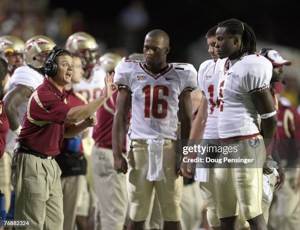 Offensive Coordinator / Quarterbacks coach Jimbo Fisher of the Florida State Seminoles coaches quarterbacks D?Vontrey Richardson Christian Ponder and...