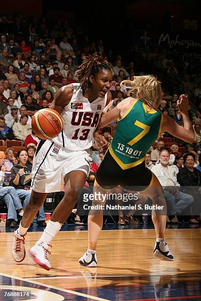 Rebekkah Brunson of the USA Women's Senior National Team drives against Carly Wilson of Australia on September 19, 2007 at the Mohegan Sun Arena in...