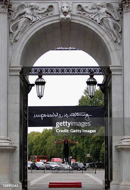 Gymnast Louis Smith in action on the rings under Marble Arch on September 20, 2007 in London ,England. Adidas were announced as sponsors of London...