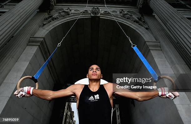 Gymnast Louis Smith in action on the rings under Marble Arch on September 20, 2007 in London, England. Adidas were announced as sponsors of London...