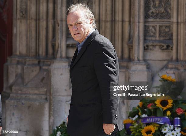 French TV presenter Laurent Cabrol arrives to attend French TV star Jacques Martin's funeral on September 20, 2007 in Lyon, France.