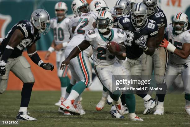 Ronnie Brown of the Miami Dolphins carries the ball during a game against the Dallas Cowboys at Dolphin Stadium on September 16, 2007 in Miami,...