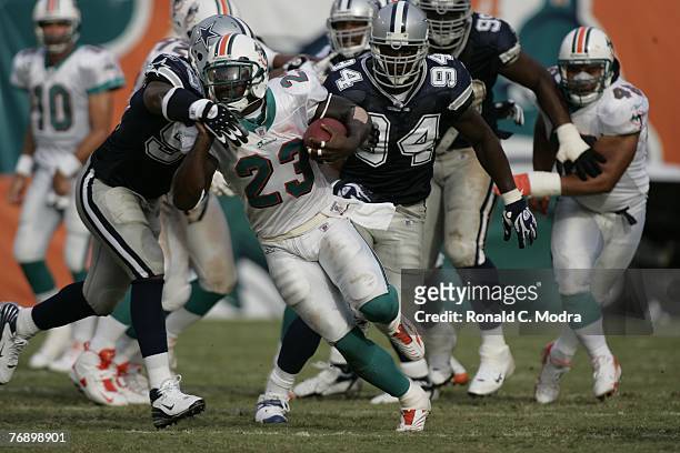 Ronnie Brown of the Miami Dolphins carries the ball during a game against the Dallas Cowboys at Dolphin Stadium on September 16, 2007 in Miami,...