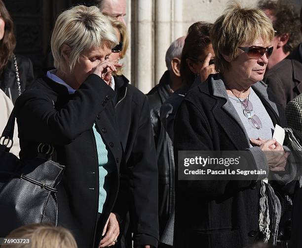 French TV Presenter Danielle Gilbert and French Singer Alice Donna attend French TV star Jacques Martin's funeral on September 20, 2007 in Lyon,...