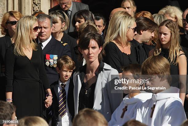 Jeanne-Marie Martin, Clovis Martin, Judith Martin and Juliette Martin leave the Cathedral St Jean after the French TV star Jacques Martin's funeral...