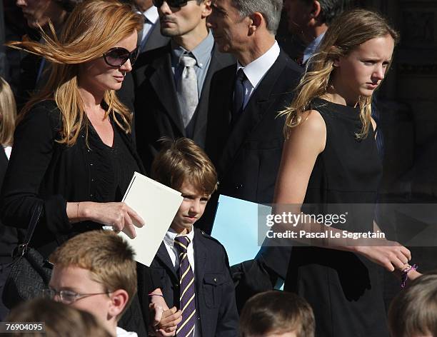 Celine Martin, Clovis Martin and Juliette Martin leave the Cathedral St Jean after the French TV star Jacques Martin's funeral on September 20, 2007...