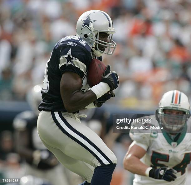 Terrell Owens of the Dallas Cowboys catching a pass during a game against the Miami Dolphins at Dolphin Stadium on September 16, 2007 in Miami,...