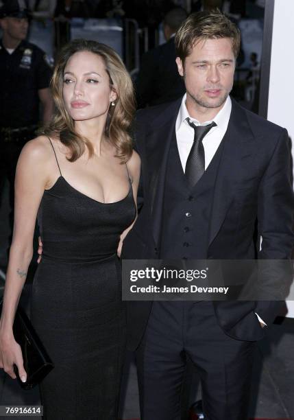 Angelina Jolie and Brad Pitt arrive at the premiere of "The Assassination of Jesse James by the Coward Robert Ford" at the Ziegfeld Theatre in New...