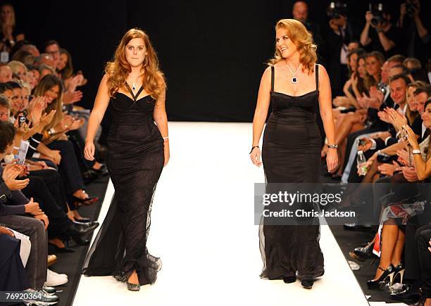 Sarah Ferguson, Duchess of York and her daughter Princess Beatrice walk down the catwalk in the Fashion For Relief Show during London Fashion Week...