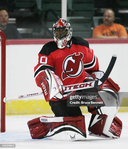 Kevin Weekes of the New Jersey Devils takes shots in warmups prior to his game against the Phuiladelphia Flyers on September 17, 2007 at the...