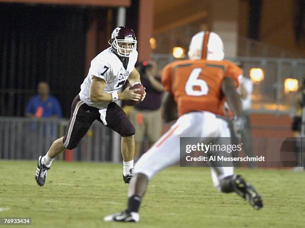 Quarterback Stephen McGee of Texas A & M looks for a gain against the University of Miami at the Orange Bowl on September 20, 2007 in Miami, Florida....