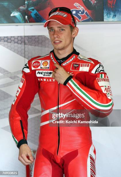 Casey Stoner of Australia and Ducati Marlboro team returns to the pits during free practice for round 15 of the 2007 MotoGP World Championship, the...