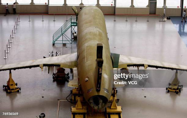 Near complete ARJ21 series aircraft, China's first domestically designed and manufactured commercial aircraft, is seen during a ceremony on September...