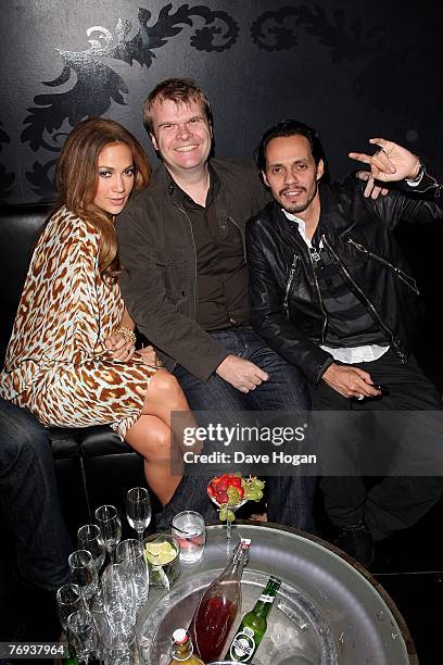 Jennifer Lopez, husband Marc Anthony and record label executive Rob Stringer attend a party to promote Lopez's new album 'Brave' at Amika on...