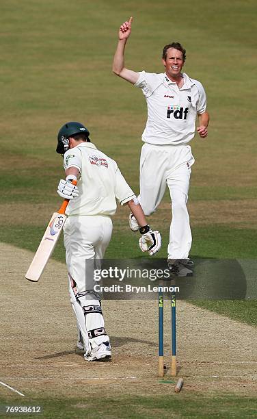 Robin Martin Jenkins of Sussex celebrates taking the wicket of Stephen Moore of Worcestershire during the LV County Championship match between Sussex...