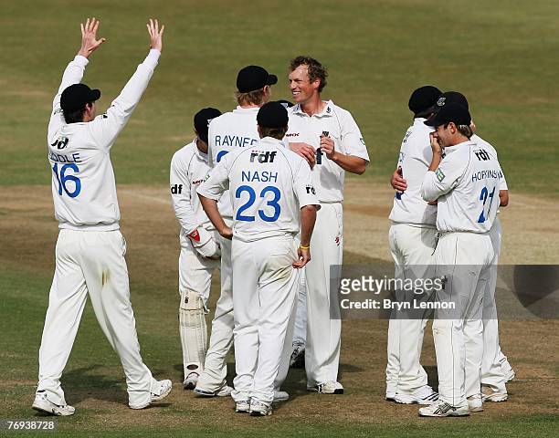 Robin Martin Jenkins of Sussex celebrates taking the wicket of Stephen Moore of Worcestershire during the LV County Championship match between Sussex...