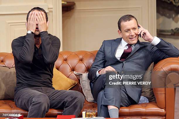 French actors Arthur and Dany Boon perform during a rehearsal of the play "Le d?ner de Cons", 19 September 2007 at the Theatre de la Porte...
