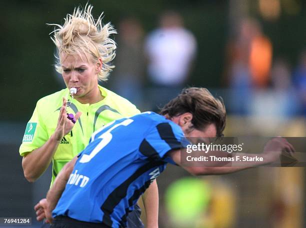Referee Bibiana Steinhaus and Jan Maenner of Paderborn in action during the 2nd Bundesliga match between SC Paderborn and TSG Hoffenheim at the...