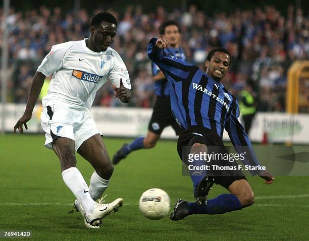 Chinedu Ogbuke Obasi of Hoffenheim and David Fall of Paderborn tackle for the ball during the 2nd Bundesliga match between SC Paderborn and TSG...