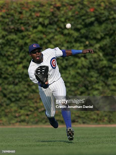 Felix Pie of the Chicago Cubs makes a running catch in the 9th inning against the Pittsburgh Pirates at Wrigley Field September 21, 2007 in Chicago,...
