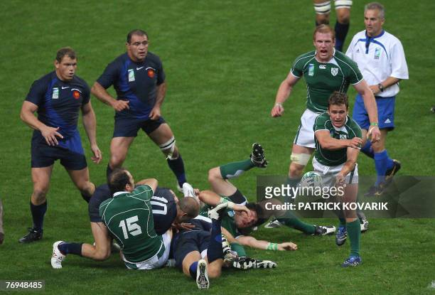 Ireland's scrum-half Eoin Reddan clears the ball out of a ruck during the rugby union World Cup group D match France vs. Ireland, 21 September 2007...