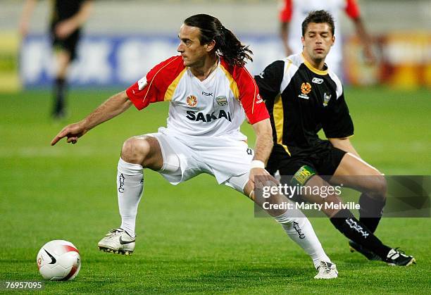 Angelo Costanzo of Adelaide gets away from Felipe of the Phoenix during the round five A-League match between the Wellington Phoenix and Adelaide...