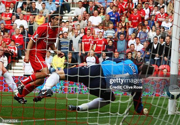 Julio Arca of Middlesbrough scores past Craig Gordon of Sunderland during the Barclays Premier League match between Middlesbrough and Sunderland at...