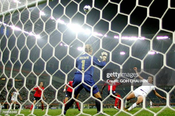 Abby Wambach of the USA attempts to score against England's goalkeeper Rachel Brown during their quarterfinal match of the FIFA Women's World Cup...