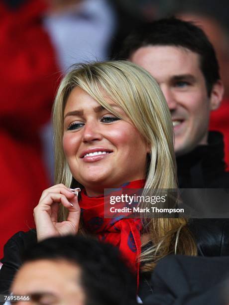 Alex Curran, wife of Liverpool footballer Steven Gerrard looks on prior to the Barclays Premier League match between Liverpool and Birmingham City at...