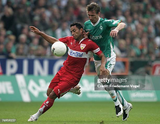 Jurica Vranjes of Werder fights for the ball with Antonio da Silva of Stuttgart during the Bundesliga match between Werder Bremen and VfB Stuttgart...