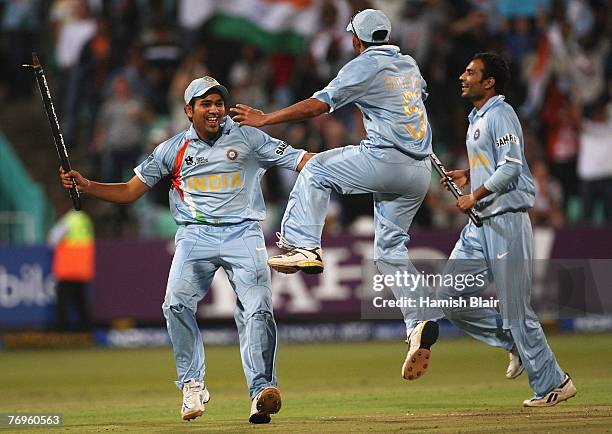 Rohit Sharma, Gautam Gambhir and Joginder Sharma of India celebrates their side's victory during the ICC Twenty20 Cricket World Championship Semi...