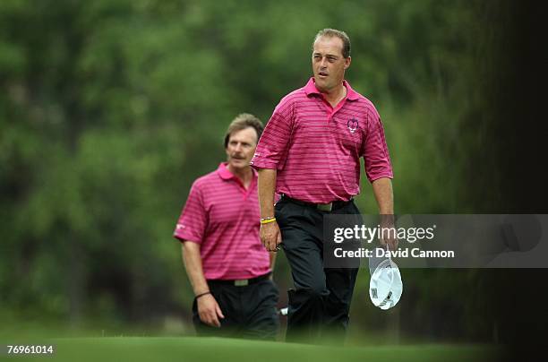 Jon Bevan and George Ryall of the Great Britain and Ireland Team walk on the 18th hole during the Saturday morning foursome matches for the 23rd PGA...