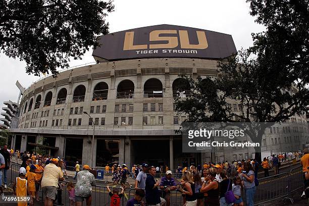 People gather outside of Tiger Stadium before the Louisiana State University Tigers play the South Carolina Gamecocks at Tiger Stadium September 22,...