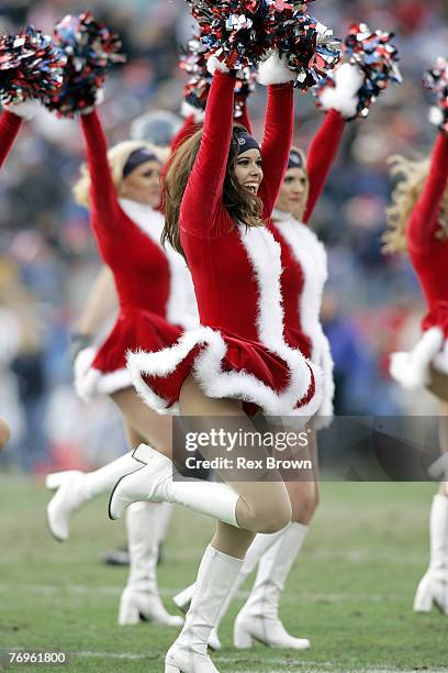 Tennessee cheerleaders work to get the crown involved during Sunday's game with Seattle December 18 at the Coliseum, in Nashville, Tennessee. Seattle...