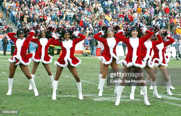 Titans cheerleaders show off their holiday outfits. The Seattle Seahawks beat the Tennessee Titans 28-24 at The Coliseum in Nashville, TN on December...