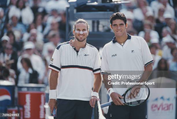 Australian tennis players Patrick Rafter and Mark Philippoussis pictured together at the net prior to playing in the final of the 1998 US Open Men's...