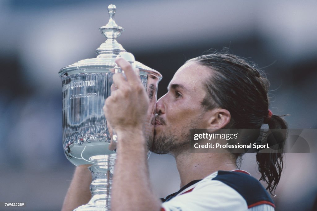 Patrick Rafter Us Open Australian tennis player Patrick Rafter kisses the US Open trophy ...
