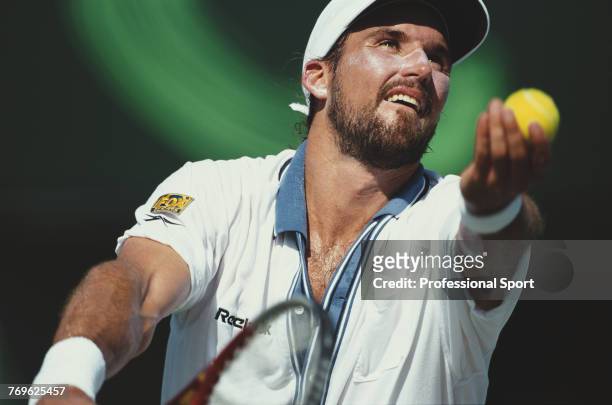 Australian tennis player Patrick Rafter pictured in action during competition to reach the fourth round of the Men's Singles event at the 2000...
