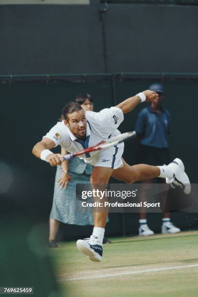 Australian tennis player Patrick Rafter pictured in action during competition to reach the final of the Men's Singles tournament at the Wimbledon...