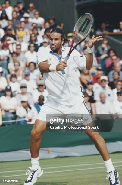 Australian tennis player Patrick Rafter pictured in action during competition to reach the final of the Men's Singles tournament at the Wimbledon...