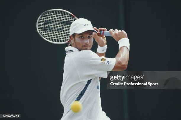 Australian tennis player Patrick Rafter pictured in action during competition to reach the final of the Men's Singles tournament at the Wimbledon...