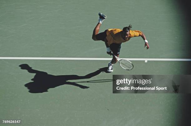 Australian tennis player Patrick Rafter pictured in action during competition to reach the semifinals of the Men's Singles tennis tournament at the...