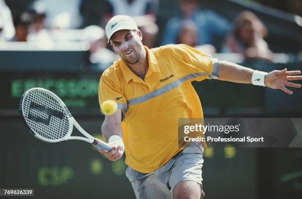 Australian tennis player Patrick Rafter pictured in action during competition to reach the semifinals of the Men's Singles event at the 2001 Ericsson...