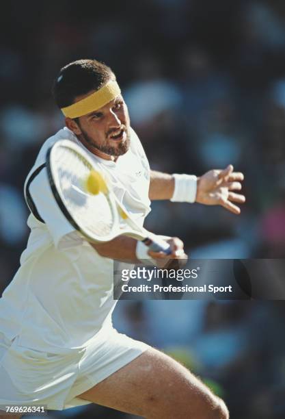 Australian tennis player Patrick Rafter pictured in action during competition to reach the final of the Men's Singles tournament at the Wimbledon...