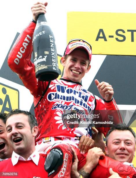 Casey Stoner of Australia and Ducati Marlboro celebrates winning the MotoGP World title after Round 15 of the 2007 MotoGP World Championship, the...