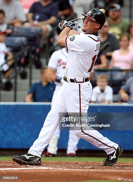 Chipper Jones of the Atlanta Braves hits a 3rd inning home run against the Milwaukee Brewers at Turner Field on September 22, 2007 in Atlanta,...