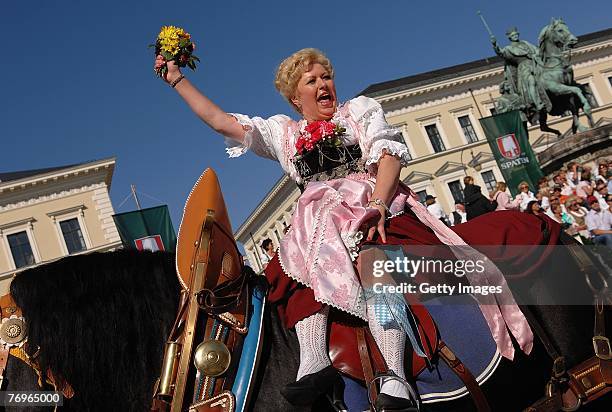 Historical dressed woman participates at the Costume and Riflemen's Parade on September 2007 in Munich, Germany. The costume and riflemen's parade...