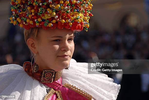 Historical dressed woman participates at the Costume and Riflemen's Parade on September 2007 in Munich, Germany. The costume and riflemen's parade...