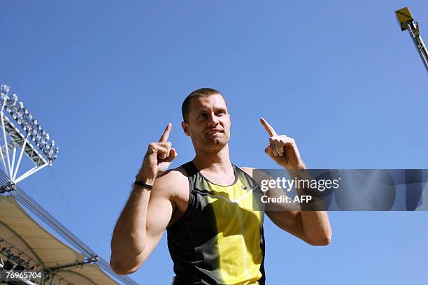 S Brad Walker celebrates winning the Pole Vault event of the IAAF/ VTB Bank World Athletics Final 23 September 2007 in the Gottlieb-Daimler stadium...